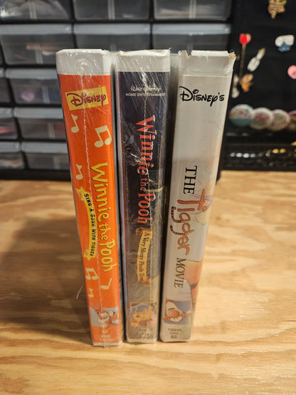 Winnie the Pooh VHS Set - Sing a Song with Tigger (NEW SEALED), A Very Merry Pooh Year (NEW SEALED), The Tigger Movie